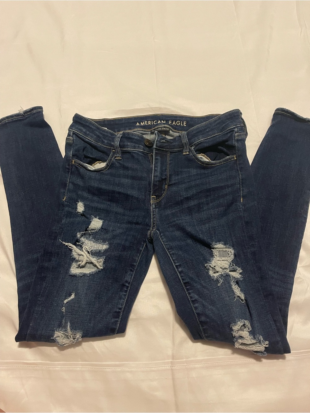 American Eagle Outfitters Navy Blue Ripped Skinny Jeans